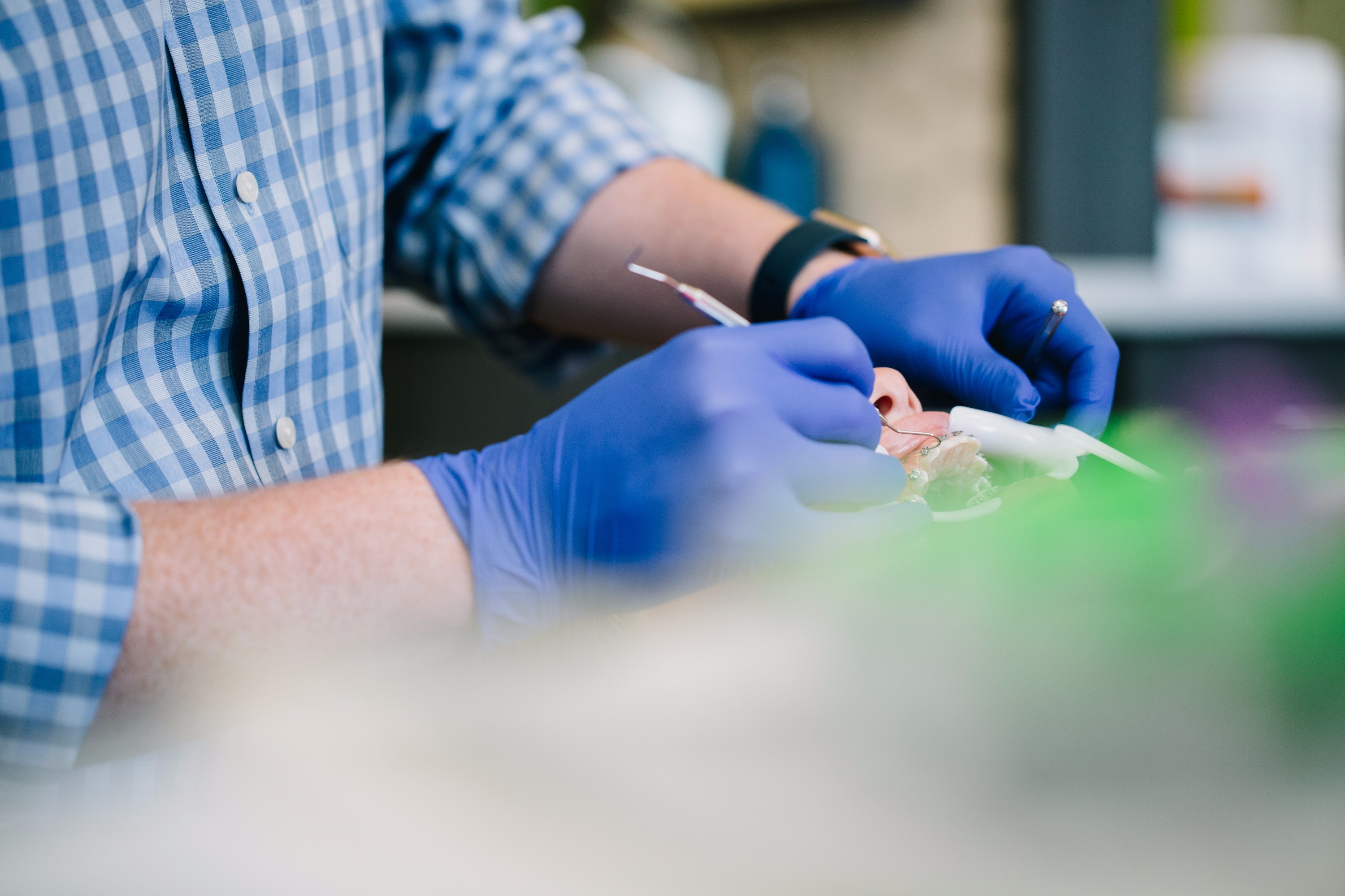 Dr. Fagala working with a patient