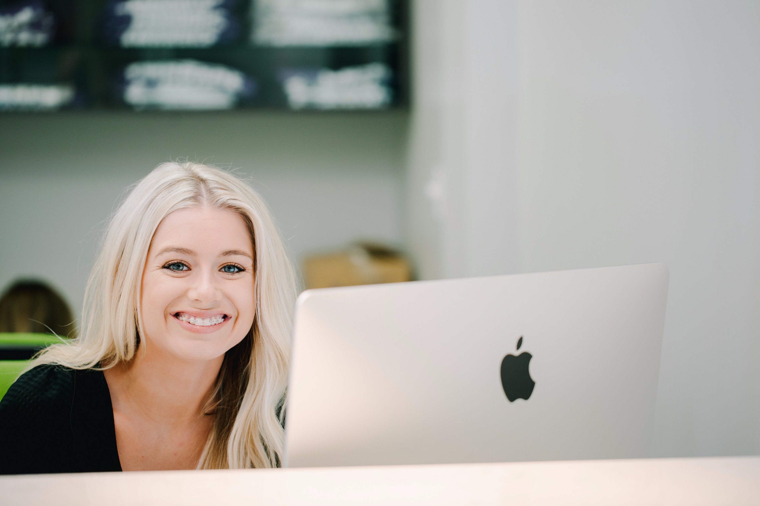 SCO staff member at front desk