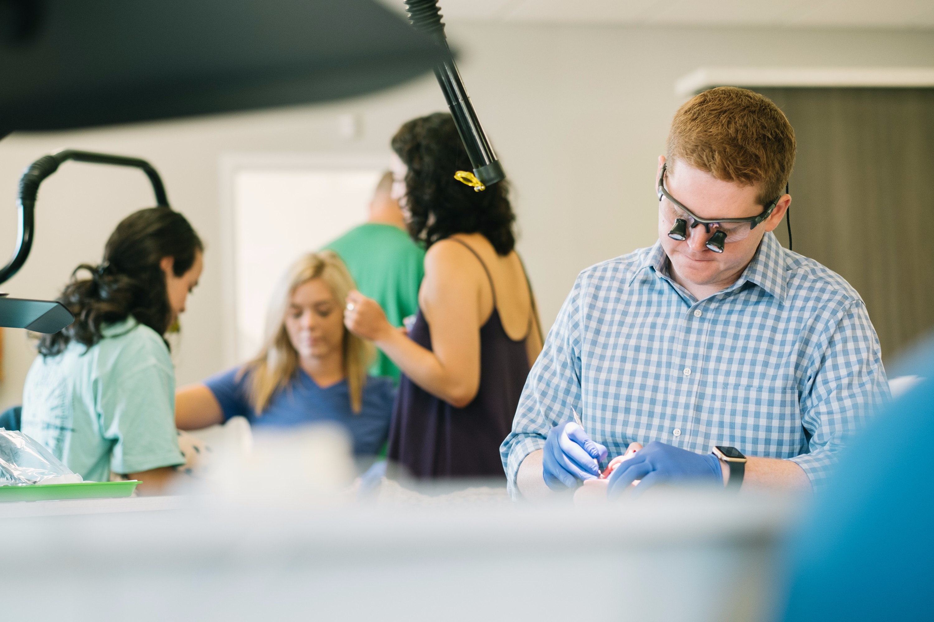 Dr. Fagala working with patient