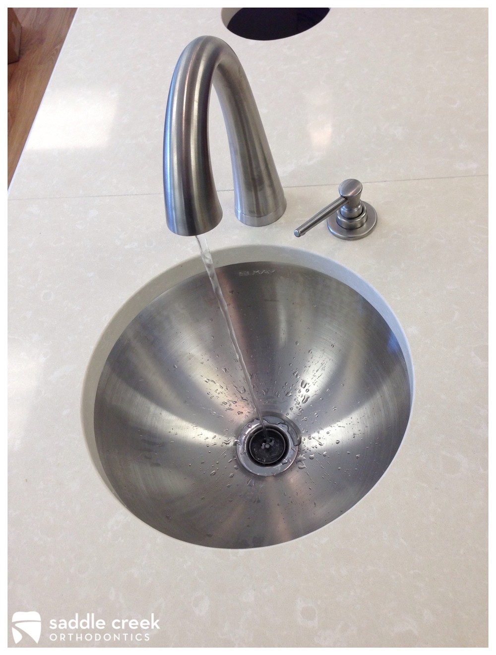 Orthodontic treatment area brushed nickel sink with foot pedals